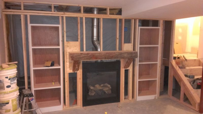 Macdonough Enterprises Basement Remodel With Fireplace And